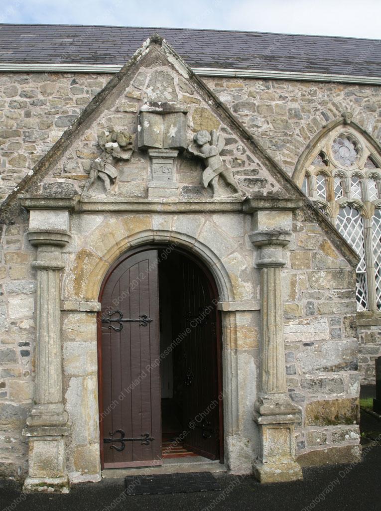 C002 - South porch and carved south window