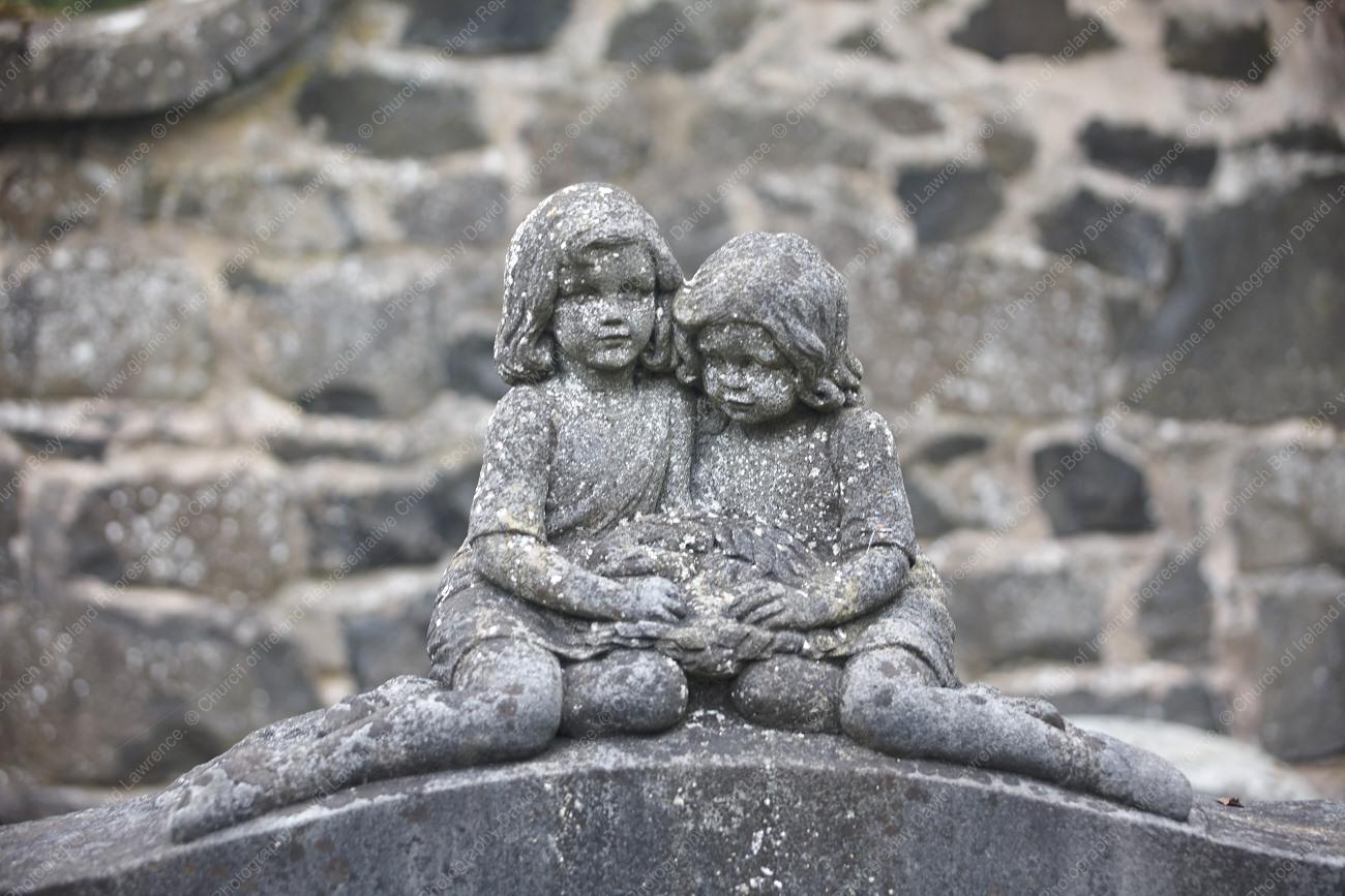 C002 - Unidentified headstone sculpture in graveyard