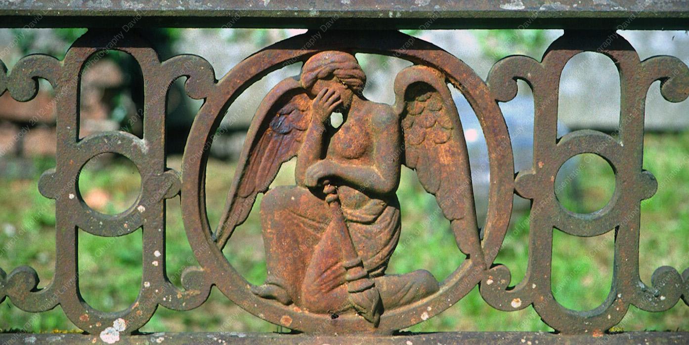 C002 - Ironwork on grave